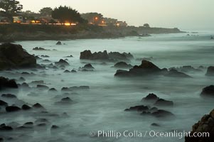 Waves breaking over rocks appear as a foggy mist in this time exposure.  Pacific Grove, Lovers Point