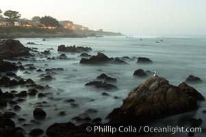 Waves breaking over rocks appear as a foggy mist in this time exposure.  Pacific Grove, Lovers Point