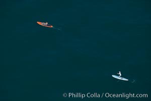 Paddleboarders on the ocean, sweepers standup paddling