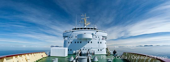 Panoramic of foredeck of M/V Polar Star, cruising through Antarctica under blue skies