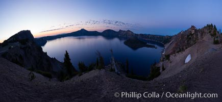 Panoramic picture of Crater Lake at dawn, sunrise, morning, panorama of Crater Lake National Park