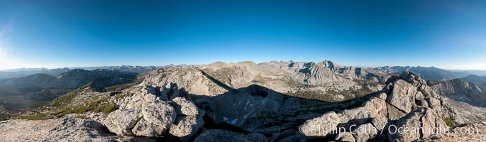 Panoramic view of the Cathedral Range from the summit of Vogelsang Peak (11500').  The shadow of Vogelsang Peak can be seen in the middle of the picture, Yosemite National Park, California.