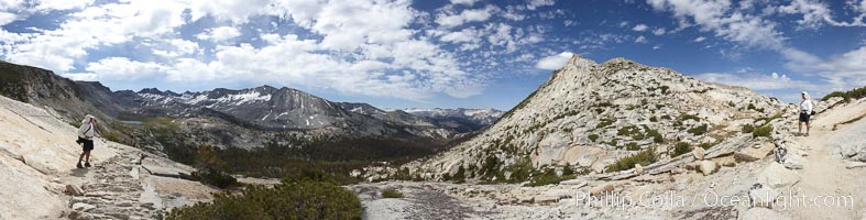 Panoramic view from Vogelsang Pass (10685')  in Yosemite's high country, looking south. A hiker appears twice in this curious panoramic photo, enjoying the spectacular view.  Visible on the left are Parson's Peak (12147'), Gallison Lake and Bernice Lake, while Vogelsang Peak (11516') rises to the right, Yosemite National Park, California