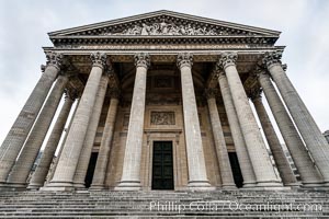 Pantheon. The Pantheon is a building in the Latin Quarter in Paris. It was originally built as a church dedicated to St. Genevieve and to house the reliquary chasse containing her relics but now functions as a secular mausoleum containing the remains of distinguished French citizens