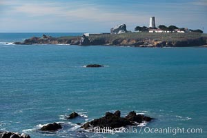 Piedras Blancas lighthouse.  Completed in 1875, the 115-foot-tall Piedras Blancas lighthouse is one of the few tall-style lighthouses on the West Coast of the United States.  Piedras Blancas, named for a group of three white rocks just offshore, is north of San Simeon, California very close to Hearst Castle