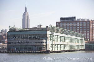 Pier 57.  Manhattan waterline.  Pier 57 is a long pier built on floating concrete caissons in the Hudson River in Manhattan, New York City. Built in 1952, it is located near the end of 15th Street on the West Side Highway, just south of the Chelsea Piers sports complex