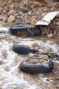 Pollution accumulates in the Tijuana River Valley following winter storms which flush the trash from Tijuana in Mexico across the border into the United States, Imperial Beach, San Diego, California