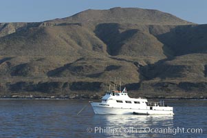 Dive boat Conception at anchor in Pyramid Cove.  San Clemente Island is used as a US Navy bombing target.  Its offshore kelp forests offer spectacular diving