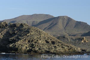 Rugged, volcanic coastline of San Clemente Island at Pyramid Cove, near the islands southeastern tip.  San Clemente Island is used as a US Navy bombing target