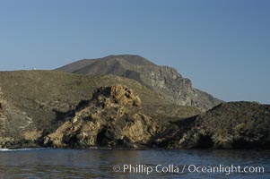 Rugged, volcanic coastline of San Clemente Island at Pyramid Cove, near the islands southeastern tip.  San Clemente Island is used as a US Navy bombing target