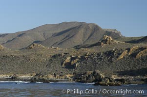 Rugged, volcanic coastline of San Clemente Island at Pyramid Cove, near the islands southeastern tip.  San Clemente Island is used as a US Navy bombing target