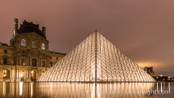 The Louvre Pyramid, Pyramide du Louvre,  large glass and metal pyramid in the main courtyard (Cour Napoleon) of the Louvre Palace (Palais du Louvre) in Paris, Musee du Louvre