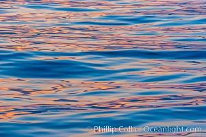 Sunset light is reflected on the placids waters