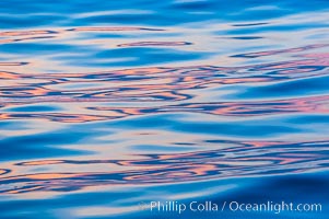 Sunset light is reflected on the placids waters