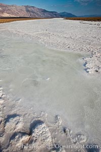 A river of salt flows across Death Valley, toward the lowest point in the United States at Badwater, Death Valley National Park, California