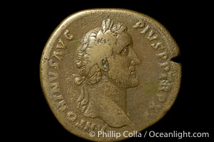 Roman emperor Antonius Pius (138-161 A.D.), depicted on ancient Roman coin (bronze, denom/type: Sestertius) (Sestertius Obverse: ANTONINVS AVG PIUS PP TR P XXIII. Reverse: FORTUNA OBSEQVENS COS IIII SC. Fortuna Obsequens std. left, holding rudder and cornucopiae.)