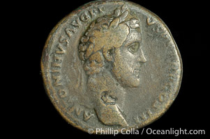 Roman emperor Antonius Pius (138-161 A.D.), depicted on ancient Roman coin (bronze, denom/type: Sestertius) (Sestertius Obverse: ANTONINVS AVG PIUS PP TR P COS III. Reverse: OPS AVG.)