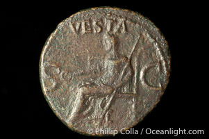 Roman emperor Caligula (37-41 A.D.), depicted on ancient Roman coin (bronze, denom/type: As) (AE As. Obverse: Bust left. C CEASAR DIVI AVG PRON AVG PM TRP IIII PP. Reverse: Vesta seated left. SC. TRP IIII = 41 AD. S616 var.)