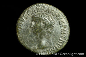 Roman emperor Claudius (41-54 A.D.), depicted on ancient Roman coin (bronze, denom/type: As) (AS, VF. Reverse: SC, Minerva standing right, spear and shield.)