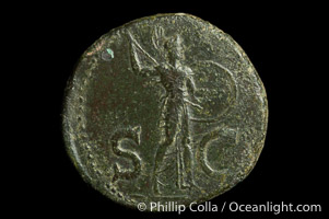 Roman emperor Claudius (41-54 A.D.), depicted on ancient Roman coin (bronze, denom/type: As) (AS, VF. Reverse: SC, Minerva standing right, spear and shield.)