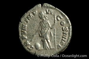 Roman emperor Commodus (177-192 A.D.), depicted on ancient Roman coin (silver, denom/type: Denarius) (AR , Denarius Obverse: M.COMMODVS.ANTON.AVG.PIVS. Reverse: PM.TR.P.VIIII.IMP.VI.COS.IIII.PP. Providentia standing left holding scepter and using baton to point to globe.)