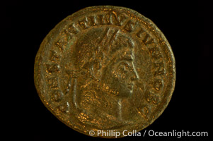 Roman emperor Constantine II (316-337 A.D.), depicted on ancient Roman coin (bronze, denom/type: AE3) (AE3. Obverse: CONSTANTINVS IVN NOB C. Reverse: C, AESAR V NOSTROR VM. Wreath enclosing VOT X.)