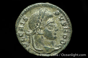 Roman emperor Crispus (316-326 A.D.), depicted on ancient Roman coin (bronze, denom/type: AE3) (AE3. Reverse: C, AESRVM NOSTRORVM. Wreath enclosing VOT V.)