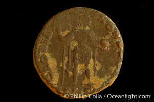 Roman emperor Honorius (393-423 A.D.), depicted on ancient Roman coin (bronze, denom/type: AE2) (AE2. Obverse: D.N.HONORIUS.PF.AVG. Reverse: GLORIA.ROMAN.ORVM. Honorius standing, facing right holding standard and globe.)