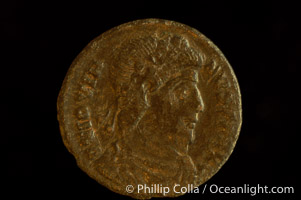 Roman emperor Jovian (363-364 A.D.), depicted on ancient Roman coin (bronze, denom/type: AE3) (AE3. nVF. Reverse: legend in wreath VOT V MVLT X.3.)