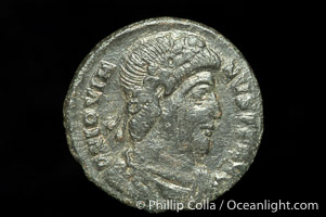 Roman emperor Jovian (363-364 A.D.), depicted on ancient Roman coin (bronze, denom/type: AE3) (AE3. nVF. Reverse: legend in wreath VOT V MVLT X.3.)