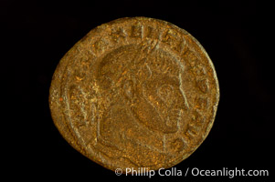 Roman emperor Maxentius (306-312 A.D.), depicted on ancient Roman coin (bronze, denom/type: Follis) (Ae Follis. Obverse: C MAXENTIVS PF AVG. Reverse: AETERNITAS AVG N in ex- MOSTP. S-3776)
