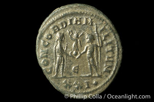 Roman emperor Maximianus (286-305 A.D.), depicted on ancient Roman coin (bronze, denom/type: Antoninianus) (Antoninianus Sear 3611. Obverse: IMP C M A MAXIMIANVS P F AVG. Reverse: CONCORDIA MILITVM)