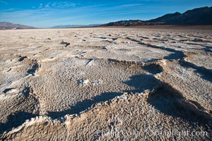 Devils Golf Course, California.  Evaporated salt has formed into gnarled, complex crystalline shapes in on the salt pan of Death Valley National Park, one of the largest salt pans in the world.  The shapes are constantly evolving as occasional floods submerge the salt concretions before receding and depositing more salt