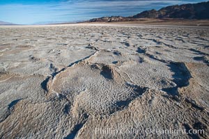 Devils Golf Course, California.  Evaporated salt has formed into gnarled, complex crystalline shapes in on the salt pan of Death Valley National Park, one of the largest salt pans in the world.  The shapes are constantly evolving as occasional floods submerge the salt concretions before receding and depositing more salt. USA, natural history stock photograph, photo id 15629