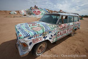 Salvation Mountain, near the desert community of Slab City and the small town of Niland on the east side of the Salton Sea.  Built over several decades by full-time resident Leonard Knight, who lives at the site, Salvation Mountain was built from over 100,000 gallons of paint, haybales, wood and metal and was created by Mr. Knight to convey the message that "God Loves Everyone"