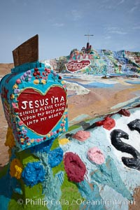 Salvation Mountain, near the desert community of Slab City and the small town of Niland on the east side of the Salton Sea.  Built over several decades by full-time resident Leonard Knight, who lives at the site, Salvation Mountain was built from over 100,000 gallons of paint, haybales, wood and metal and was created by Mr. Knight to convey the message that "God Loves Everyone"