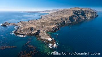 San Clemente Island Pyramid Head, the distinctive pyramid shaped southern end of the island.  San Clemente Island Pyramid Head, showing geologic terracing, underwater reefs and giant kelp forests