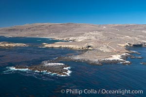 San Clemente Island, rugged barren coastline and island terrain surrounded by lush underwater kelp forests and marine life