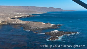 San Clemente Island, rugged barren coastline and island terrain surrounded by lush underwater kelp forests and marine life