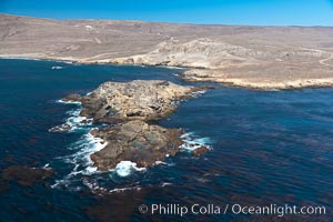 San Clemente Island, rugged barren coastline and island terrain surrounded by lush underwater kelp forests and marine life