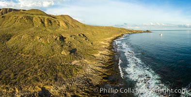 San Clemente Island aerial photo, Pyramid Head and Balanced Rock at the southern end of the island.  San Clemente Island Pyramid Head, the distinctive pyramid shaped southern end of the island, exhibits distinctive geologic terracing, underwater reefs and giant kelp forests