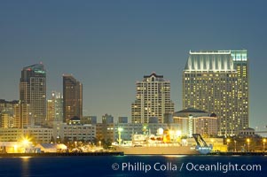 San Diego city skyline and cruise ship terminal at dusk, viewed from Harbor Island