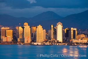 San Diego harbor skyline, late afternoon, storm clouds and mountains, Lyons Peak in the distance