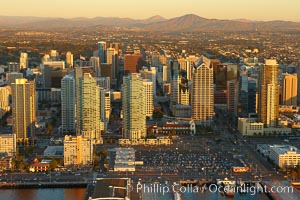 San Diego Skyline at sunset, North Harbor Drive running along the waterfront, high rise office buildings, with cruise ship terminal (right)