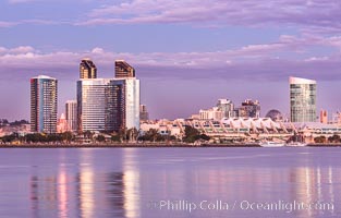 San Diego city skyline, dusk, clearing storm clouds