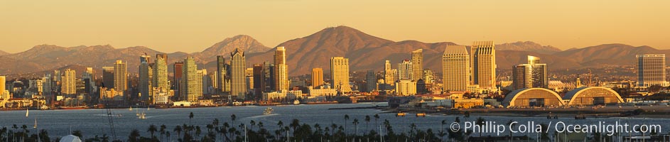 San Diego city skyline, showing the buildings of downtown San Diego rising above San Diego Harbor, viewed from Point Loma at sunset, with mountains of the Cleveland National Forest rising in the distance.  A panoramic photograph, composite of six separate images. Mount San Miguel is on right and Lyons Peak to the left. California, USA, natural history stock photograph, photo id 22252
