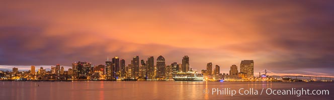 San Diego City Skyline viewed from Harbor Island, storm clouds at sunrise.