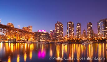 Yaletown section of Vancouver at night, including Granville Island bridge (left), viewed from Granville Island