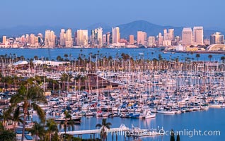 San Diego City Skyline at Sunset, viewed from Point Loma, Shelter Island Yacht Club in the foreground, San Diego Bay, Mount San Miguel (right) and Lyons Peak (left) in distance. California, USA, natural history stock photograph, photo id 36748