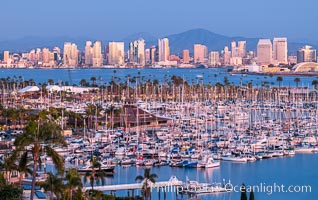 San Diego City Skyline at Sunset, viewed from Point Loma, Shelter Island Yacht Club in the foreground, San Diego Bay, Mount San Miguel (right) and Lyons Peak (left) in distance